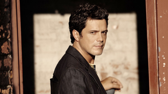 Man black jacket doorway hand free wallpaper for desktop - medium preview image