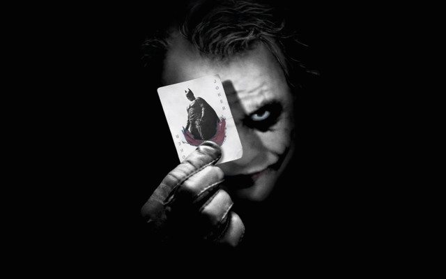Man holding joker card painted free wallpaper for desktop - medium preview image
