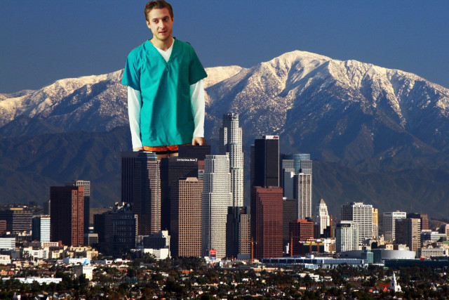 Man standing tall building city free wallpaper for desktop - medium preview image