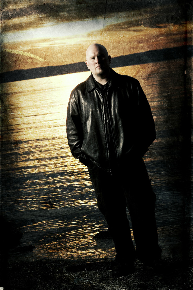 Man standing water leather jacket free wallpaper for mobile - medium preview image