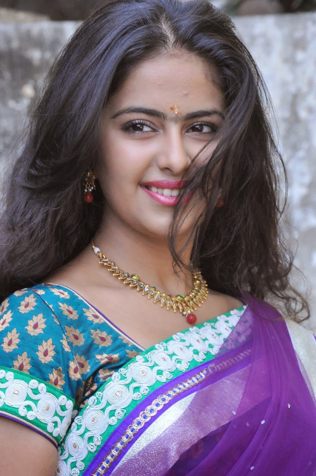 Woman sari smiling camera long free wallpaper for mobile - medium preview image