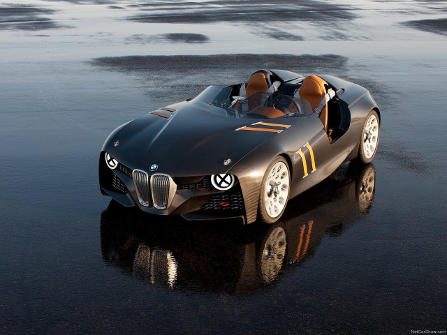 Car open top wet ground free wallpaper for desktop - medium preview image