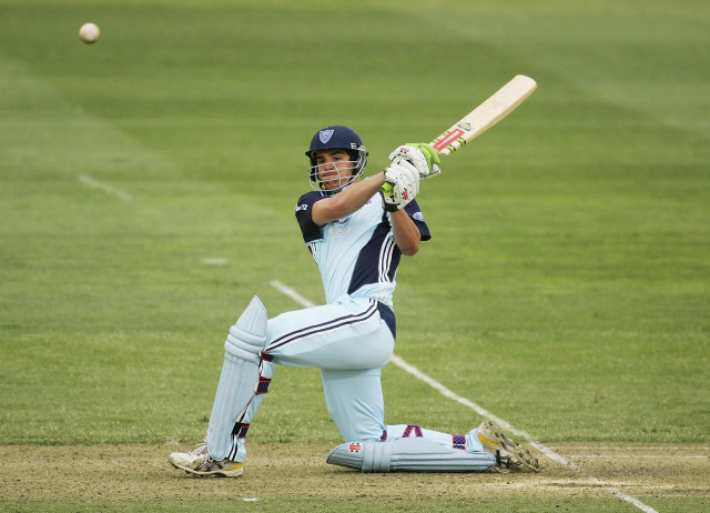 Man blue uniform swinging bat free wallpaper for desktop - medium preview image