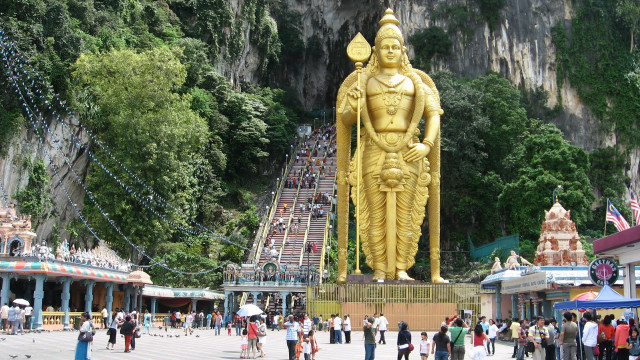 Golden statue man temple mountain free wallpaper for desktop - medium preview image