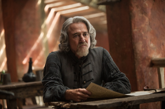 Bearded man renaissance book table free wallpaper for desktop - medium preview image