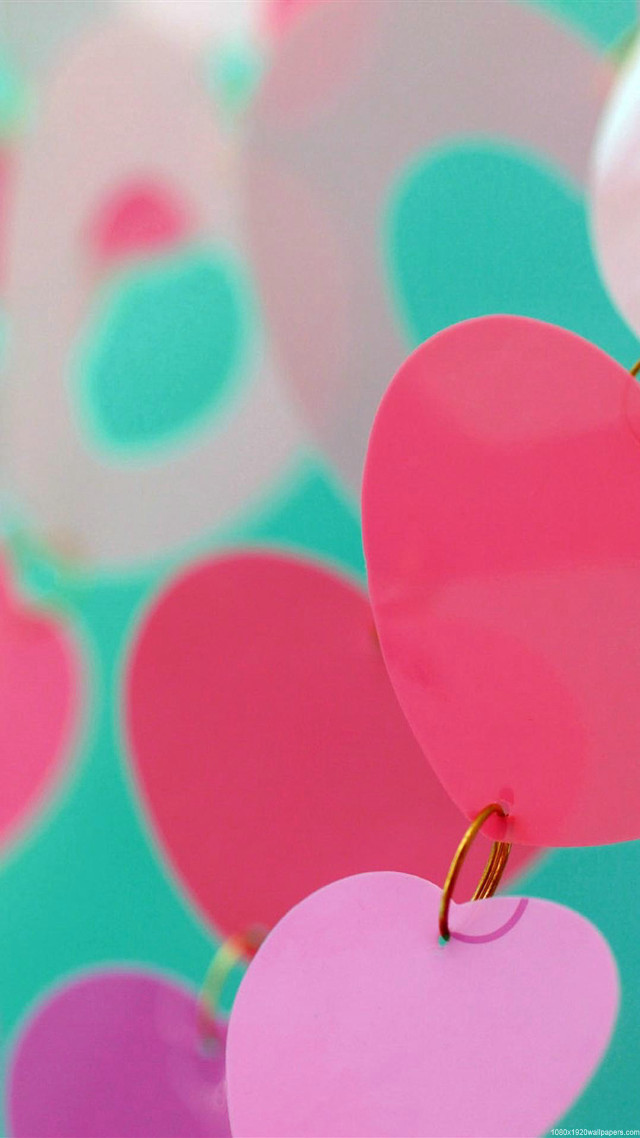 Heart shaped object hanging string free wallpaper for mobile - medium preview image