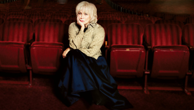 Woman redchair theater portrait ednamann free wallpaper for desktop - medium preview image