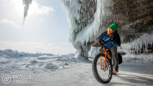 Boy bike frozen waterfall ice free wallpaper for desktop - medium preview image