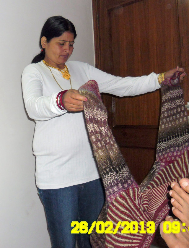 Woman holding cloth smiling woman free wallpaper for mobile - medium preview image