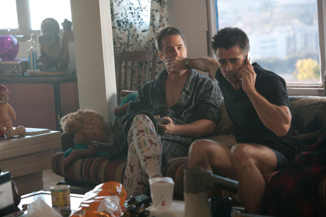 Two men couch talking cell free wallpaper for desktop - medium preview image