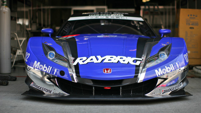 Blue sports car garage racing free wallpaper for desktop - medium preview image