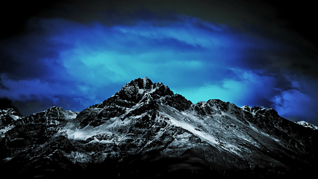 Mountain range dark sky clouds free wallpaper for desktop - medium preview image