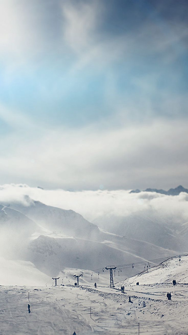 Ski slope skiers mountain clouds free wallpaper for mobile - medium preview image