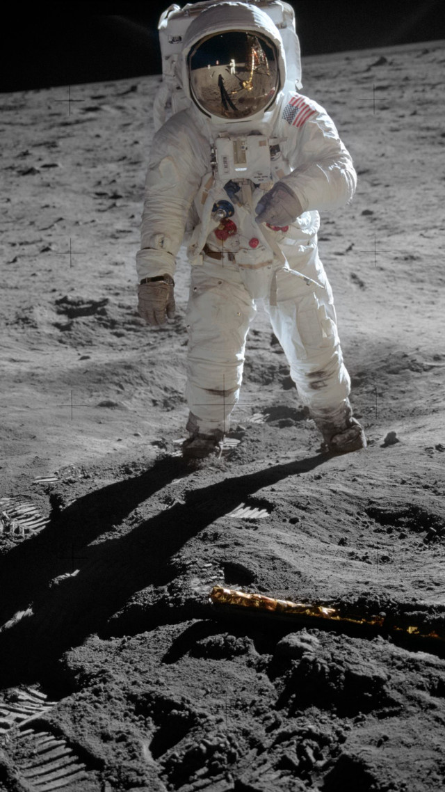 Astronaut moon walking shadow ground free wallpaper for mobile - medium preview image