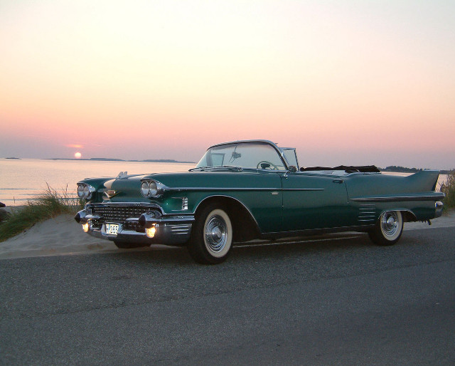 Green classic car ocean sunset free wallpaper for desktop - medium preview image