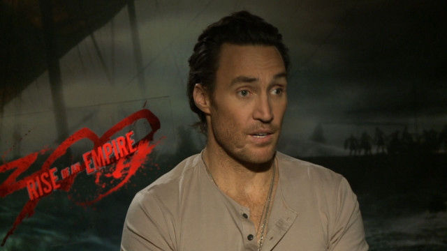 Man tan shirt creepy background free wallpaper for desktop - medium preview image