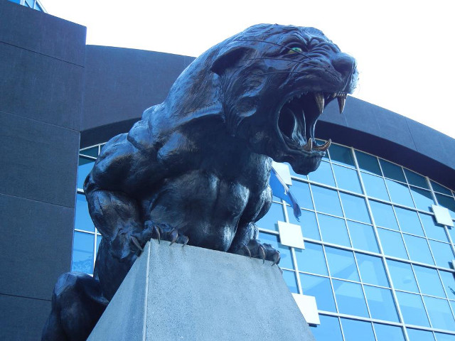 Lion bronze sculpture glass building free wallpaper for desktop - medium preview image