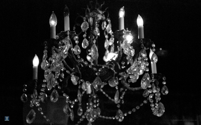 Chandelier candles lit dark black free wallpaper for desktop - medium preview image