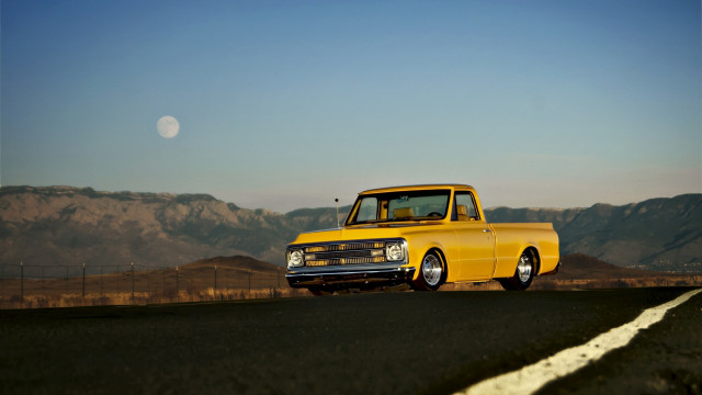 Yellow truck mountains fence full free wallpaper for desktop - medium preview image