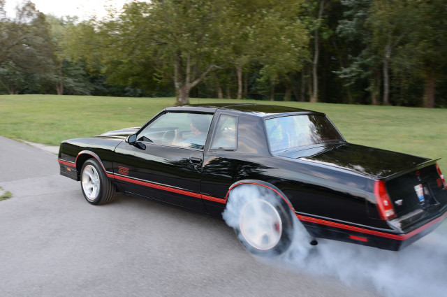 Black car red stripes smoking free wallpaper for desktop - medium preview image