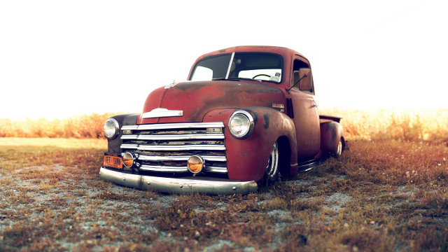 Old red truck field grass free wallpaper for desktop - medium preview image