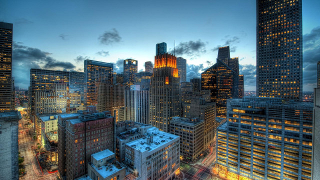 City skyline skyscrapers night clouds free wallpaper for desktop - medium preview image