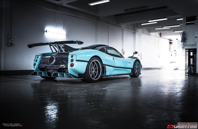 Blue sports car garage open #4 free wallpaper for desktop - medium preview image