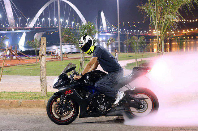 Man motorcycle night street bridge free wallpaper for desktop - medium preview image