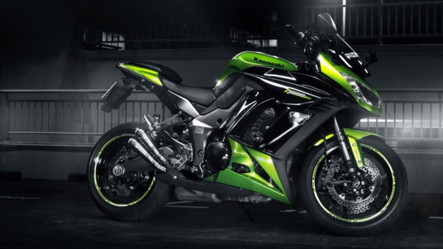 Green black motorcycle garage night free wallpaper for desktop - medium preview image