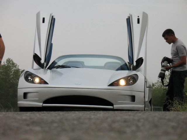 Man white sportscar open doors free wallpaper for desktop - medium preview image