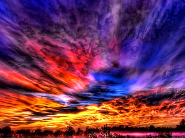Colorful sunset clouds trees background free wallpaper for desktop - medium preview image
