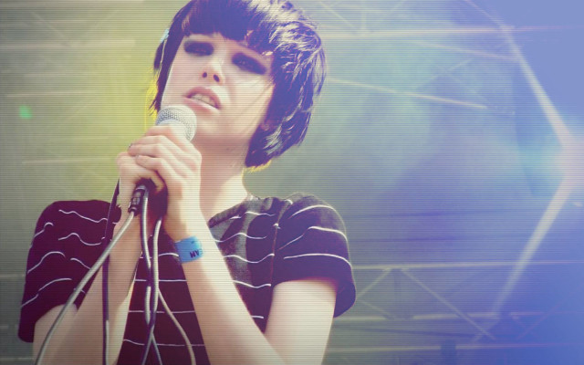 Woman headphones microphone stage backdrop free wallpaper for desktop - medium preview image