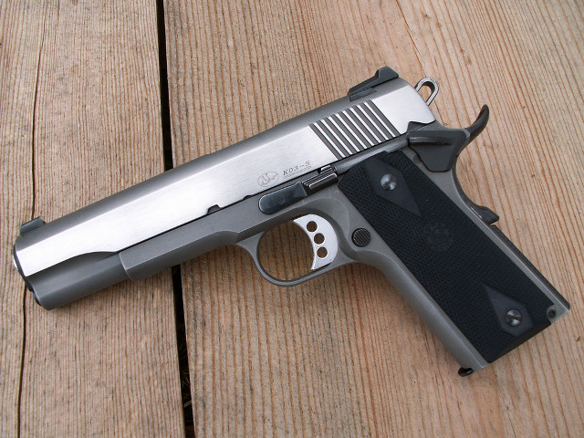 Gun wooden surface black handle free wallpaper for desktop - medium preview image