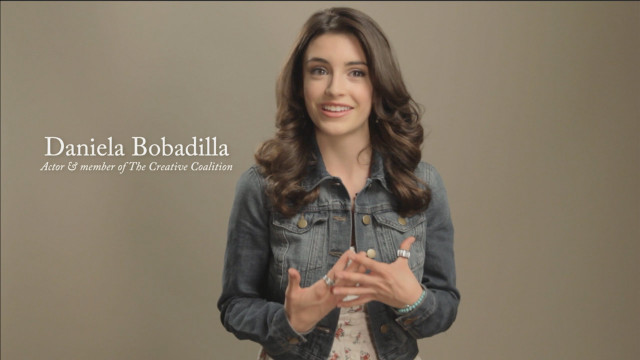 Woman jean jacket smiling hands free wallpaper for desktop - medium preview image