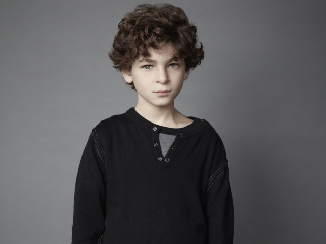 Young boy black shirt gray free wallpaper for desktop - medium preview image