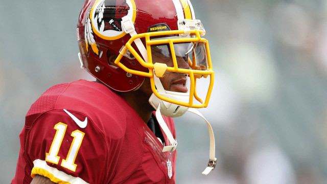 Football player helmet uniform closeup free wallpaper for desktop - medium preview image