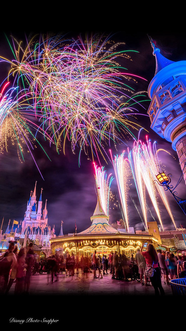 Fireworks castle night people carousel free wallpaper for mobile - medium preview image