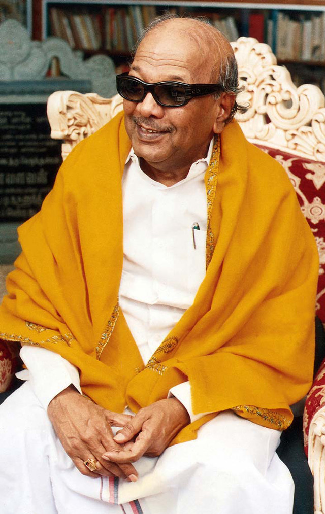 Man yellow shawl sunglasses bookcase free wallpaper for mobile - medium preview image