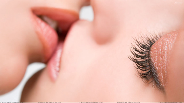 Woman long eyelashes touching face free wallpaper for desktop - medium preview image