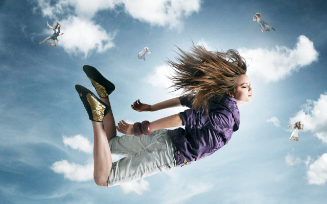Woman flying skateboard blue sky free wallpaper for desktop - medium preview image
