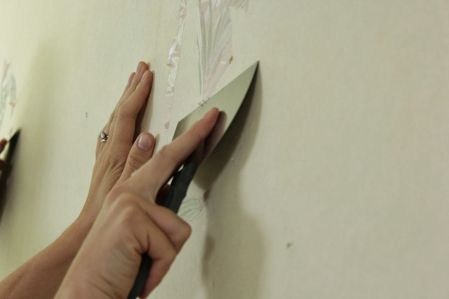 Person cutting paper wall scissors free wallpaper for desktop - medium preview image