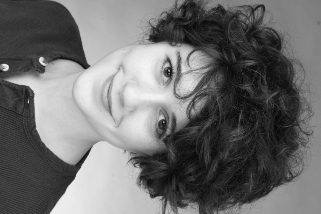 Woman short curly hair smiling free wallpaper for desktop - medium preview image