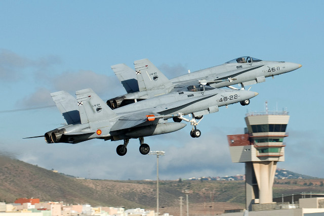 Fighterjet takeoff controltower mountain ocean free wallpaper for desktop - medium preview image