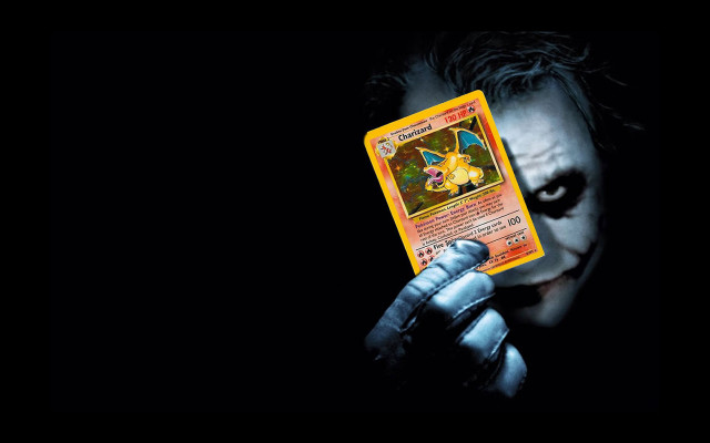 Man holding card creepy face free wallpaper for desktop - medium preview image