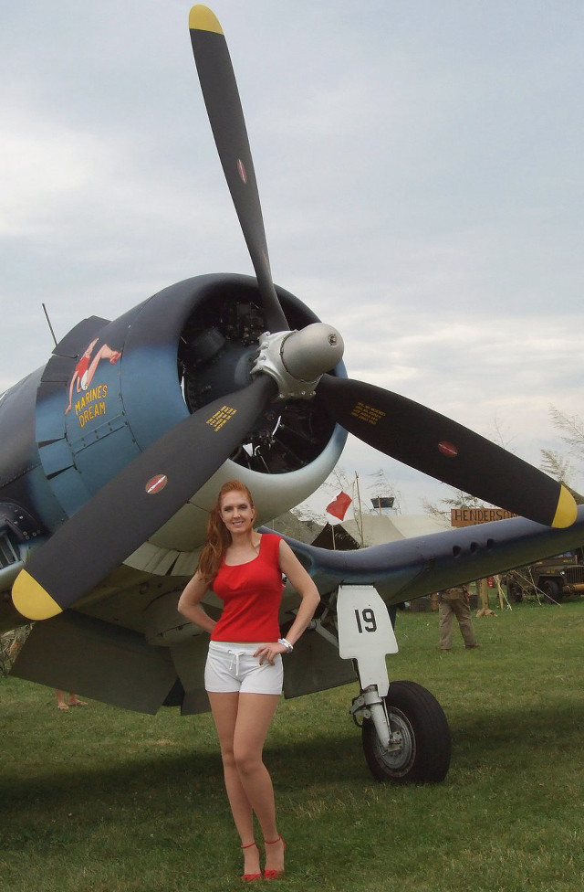 Woman plane grass field number free wallpaper for mobile - medium preview image