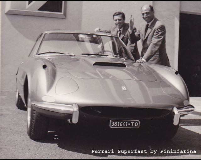 Two men sports car building free wallpaper for desktop - medium preview image