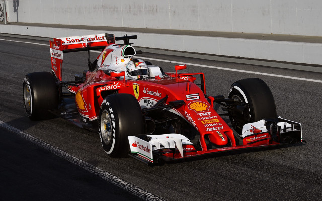 Man driving red race car #2 free wallpaper for desktop - medium preview image