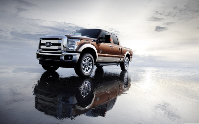 Truck parked reflective surface sky free wallpaper for desktop - medium preview image