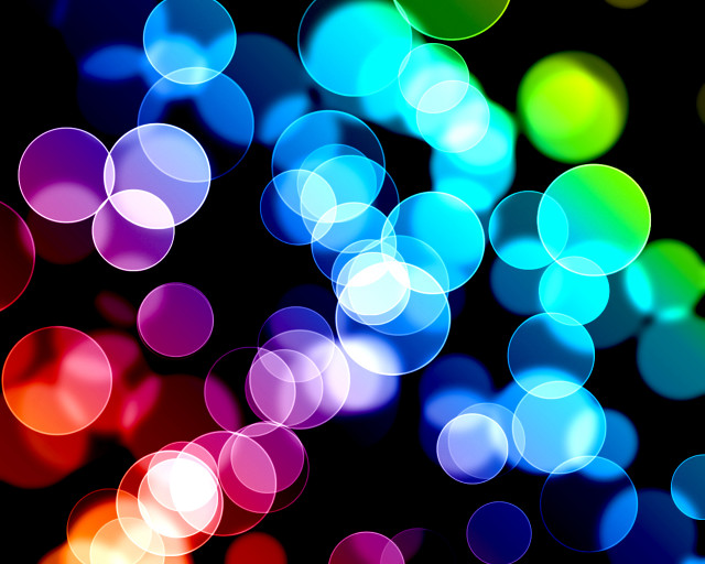 Blurry black background multicolored circle free wallpaper for desktop - medium preview image