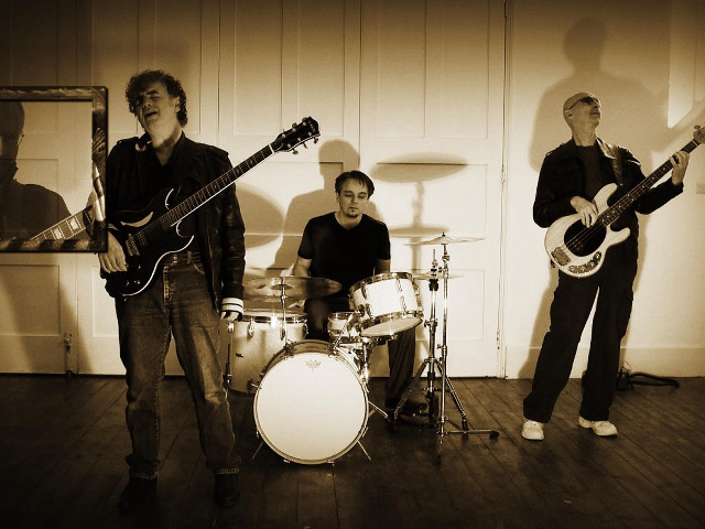 Men playing guitars drums room free wallpaper for desktop - medium preview image